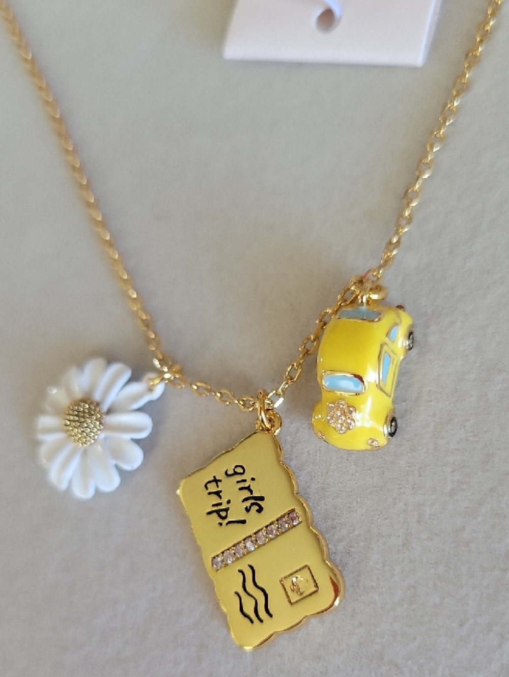Kate Spade Gold Chain Necklace with Daisy, Yellow Car & 'Girls Trip' Charm - Picture 6 of 8